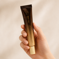 Dr. Reju-All PDRN cream held in hand